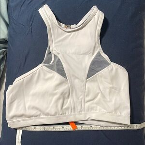 Chestee white swim top with collarbone protection